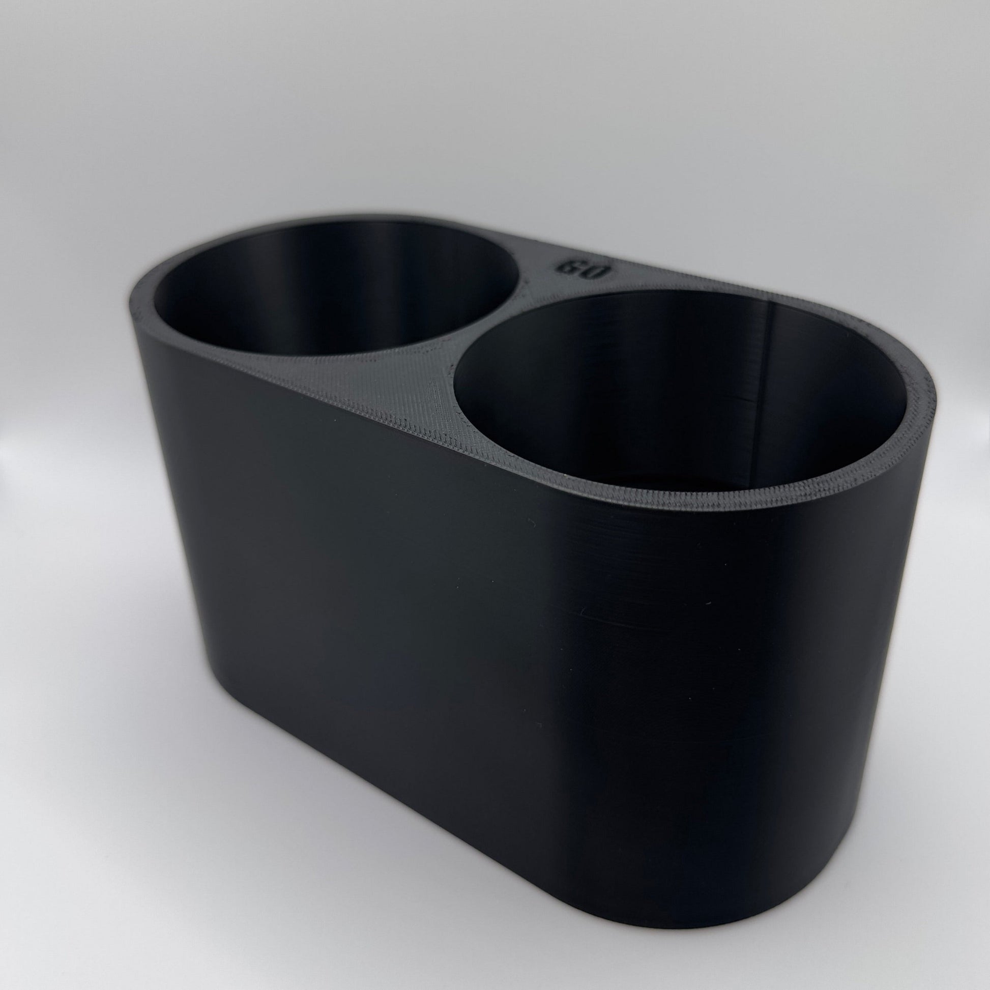 Vooraanzicht van 3D-geprinte dubbele bekerhouder voor MX5 NA en NB